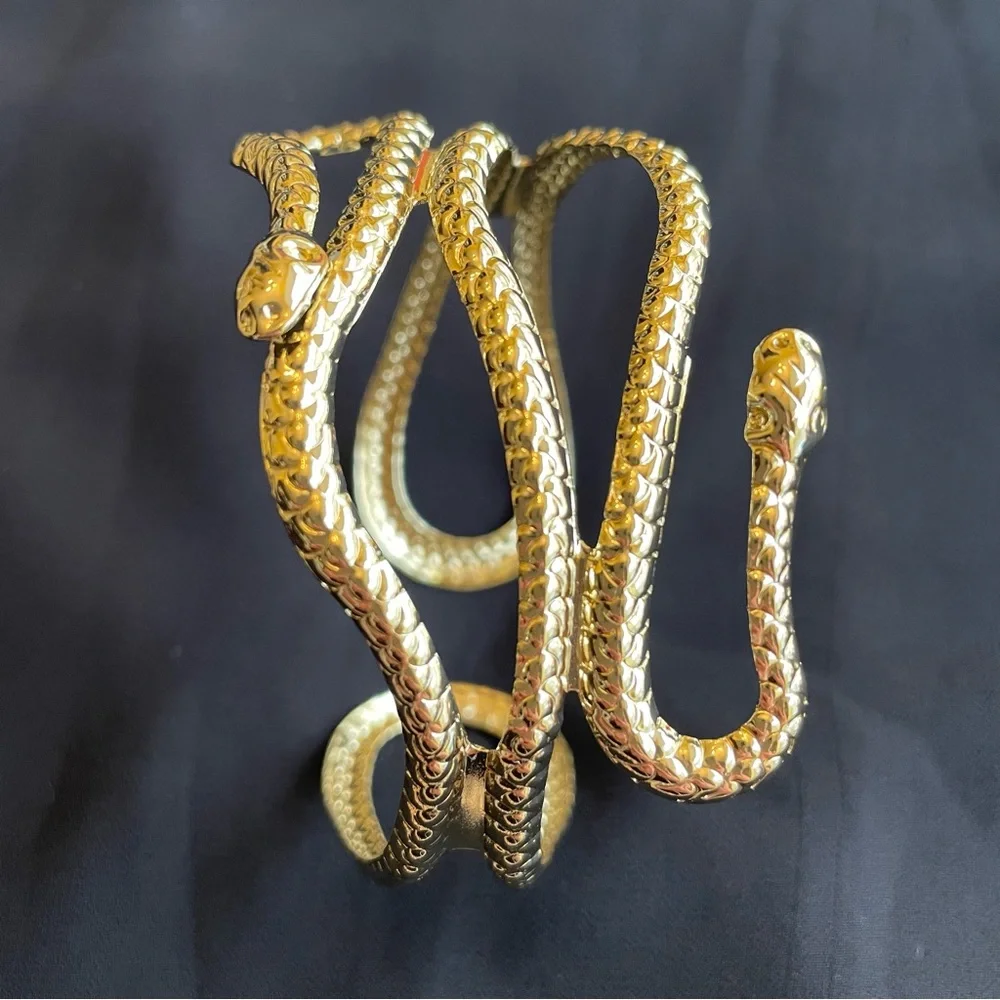 Gold tone metal snake arm cuff